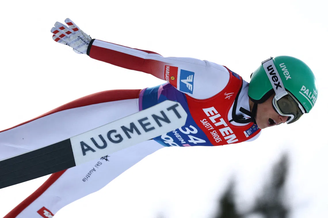 FILE PHOTO: Nordic Skiing - FIS Nordic World Ski Championships - Trondheim, Norway - March 7, 2025  Austria's Eva Pinkelnig in action during the women's large hill HS138 first round REUTERS/Kai Pfaffenbach/File Photo