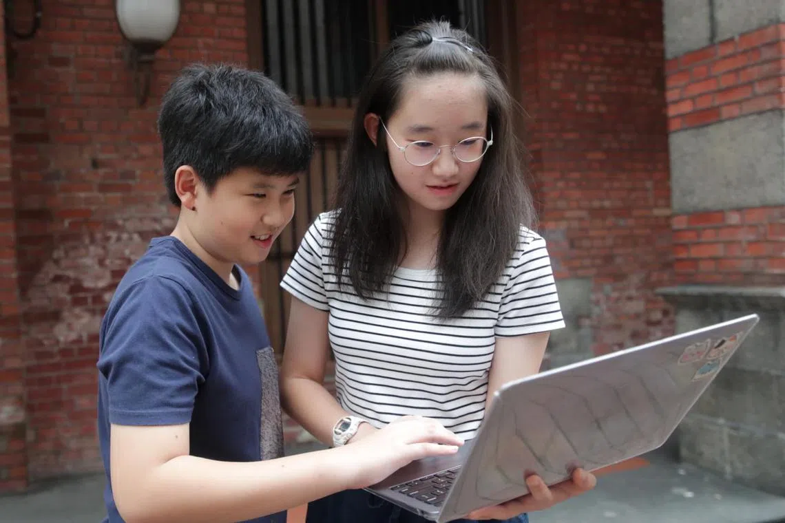 Sophie Sim, 14, and her brother, Ethan, 11, have tried using ChatGPT together with their parents. 