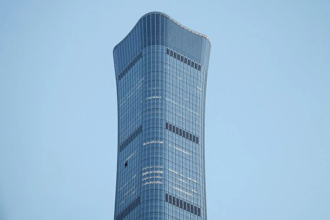 Visible damage to the CITIC Tower in Beijing after the crash killed the plane’s pilot and injured 13 other people at the site.