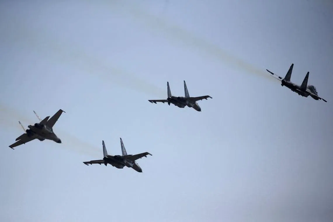 FILE PHOTO: Indonesian Air Force's fighters jet perform during celebrations for the 74th Indonesian National Armed Forces day at Halim Perdanakusuma airbase in Jakarta, Indonesia, October 5, 2019. REUTERS/Willy Kurniawan/File Photo