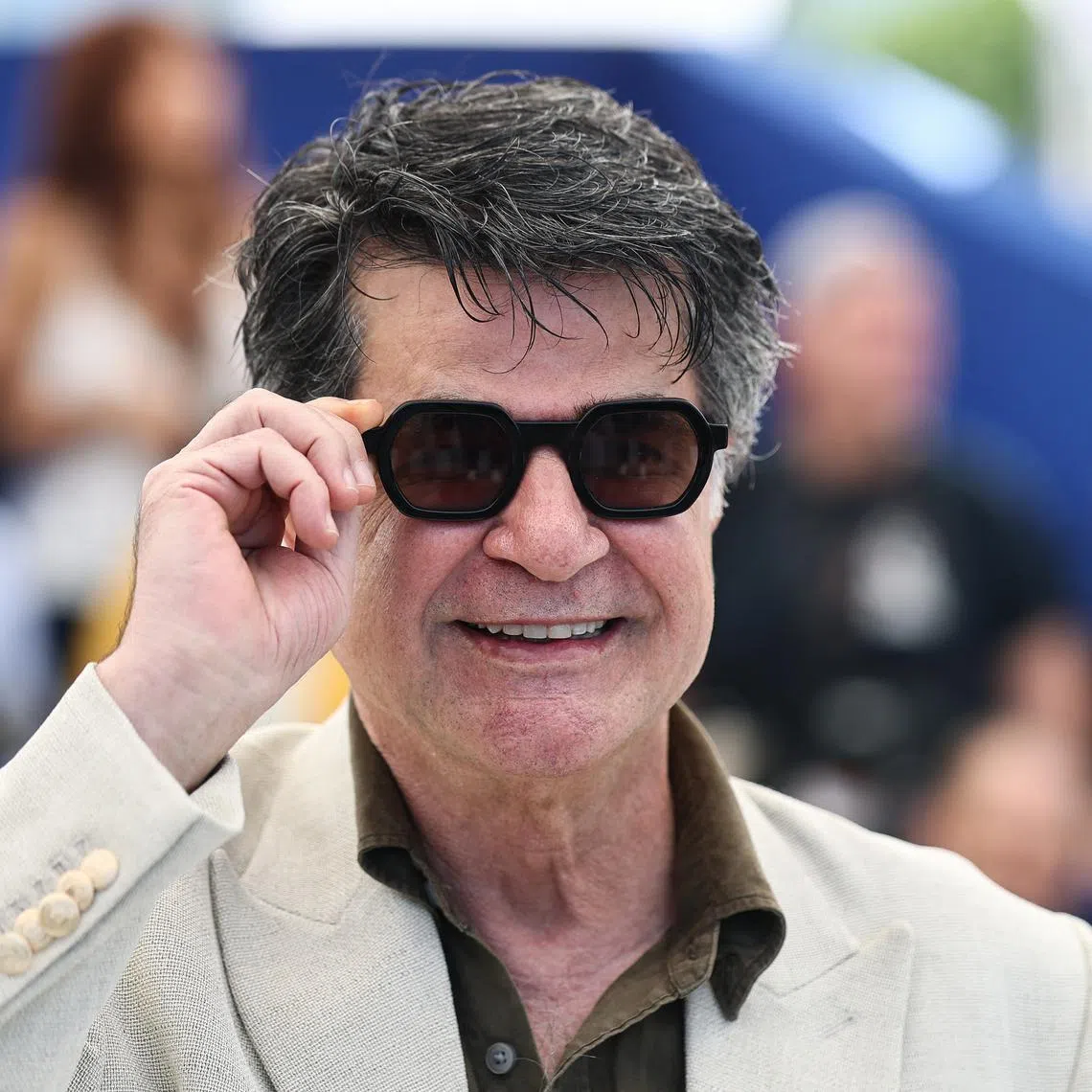 Director Jafar Panahi poses during a photocall for the film \"Un simple accident\" (It Was Just an Accident) in competition at the 78th Cannes Film Festival in Cannes, France, May 21, 2025. REUTERS/Stephane Mahe