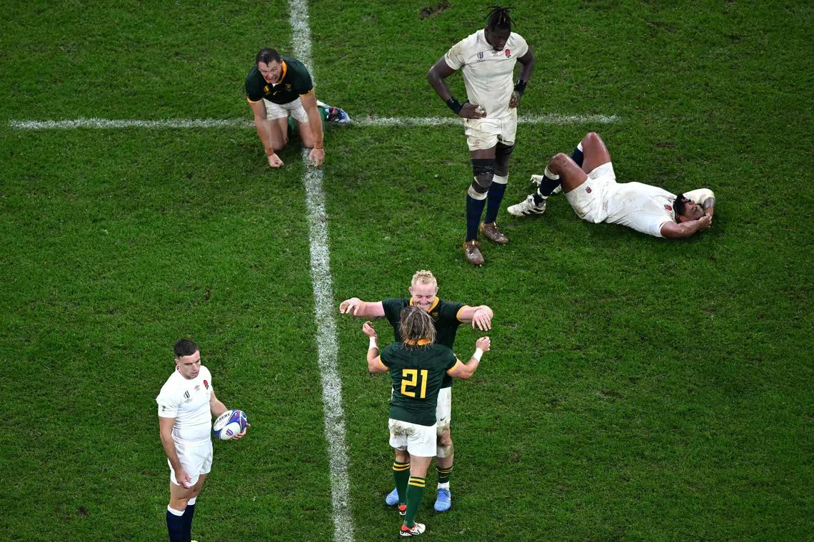 South Africa players celebrate after beating England in the Rugby World Cup semi-final.