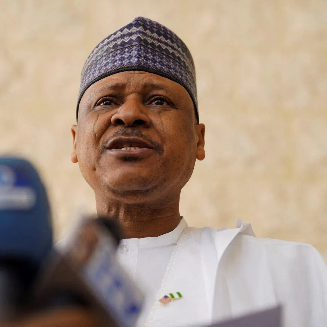 FILE PHOTO: Nigeria's Minister of Information, Mohammed Idris Malagi, reacts during a press briefing at the inauguration of the Nigeria U.S. Joint Working Group to boost counterterrorism cooperation at the Office of the National Security Adviser in Abuja, Nigeria, January 22, 2026. REUTERS/Marvellous Durowaiye/File Photo