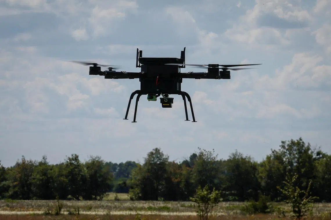 FILE PHOTO: The AI-enabled drone of Swarmer company flies, amid Russia's attack on Ukraine, in Kyiv region, Ukraine June 27, 2024.  REUTERS/Gleb Garanich/File Photo