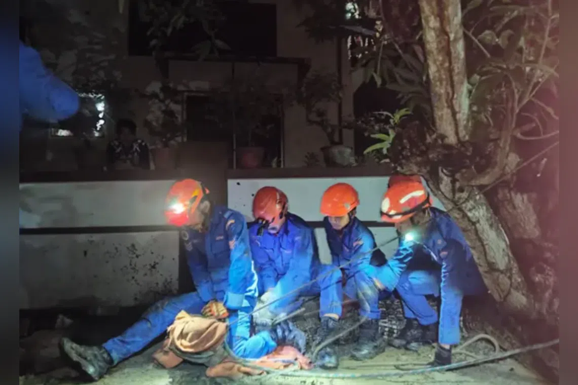 The district operations control centre received an emergency call about a crocodile seen emerging from beneath a stilt house after chasing a dog.