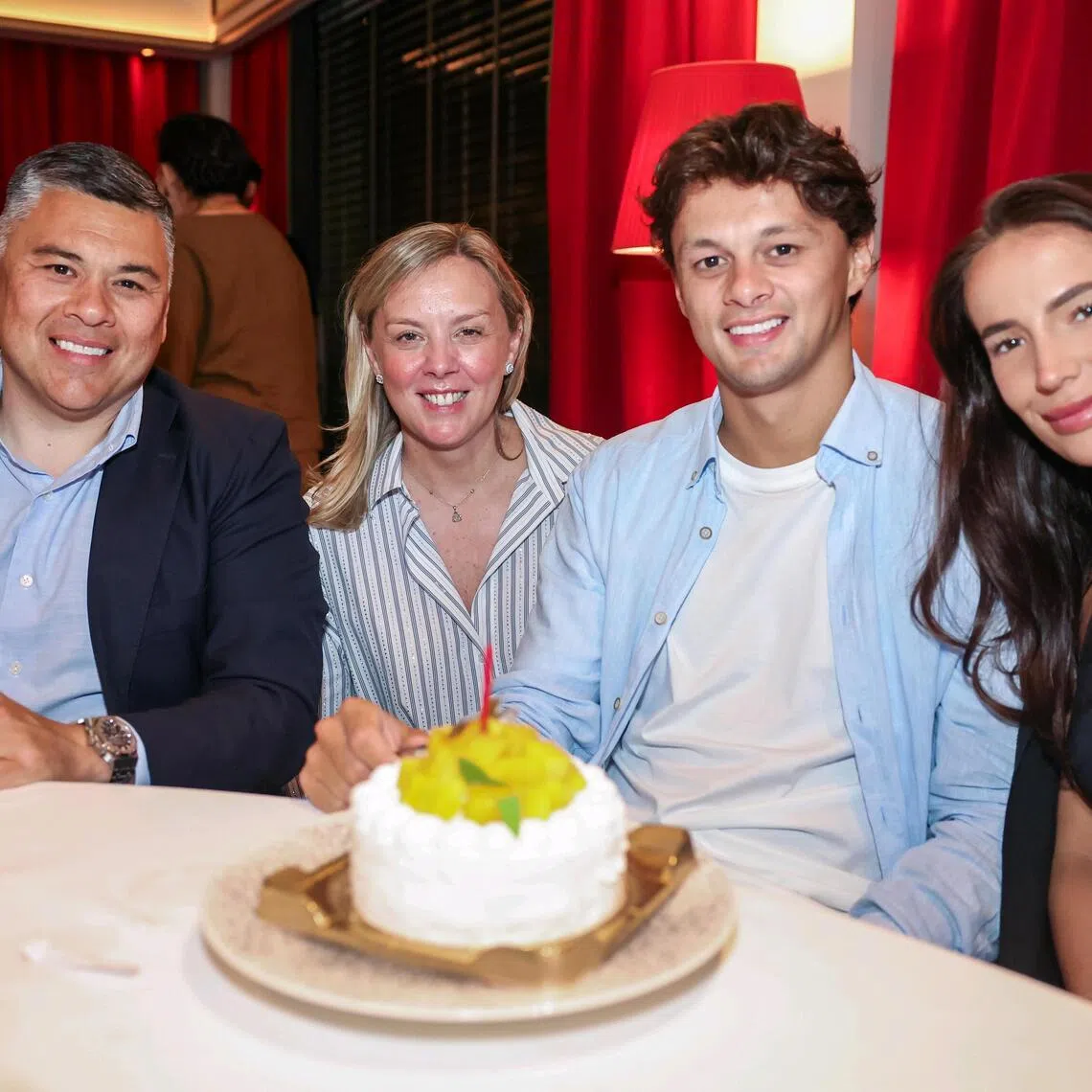 Cardiff City right-back and Singapore PR Perry Ng celebrating his 30th birthday with his father Perry Ng Sr, 51, mother Lisa Ng, 52, and fiancee Lucy Owen, 26, at Madame Fan restaurant at the NCO Club on June 24, 2026. 