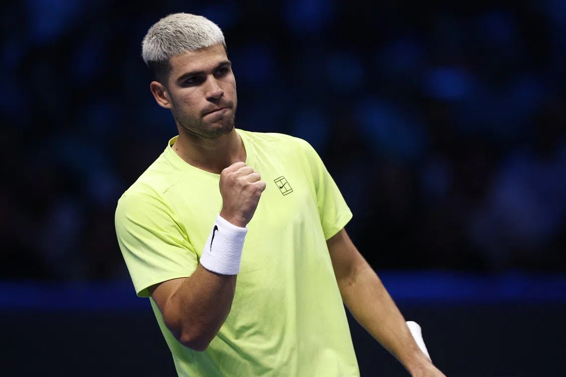 Tennis - ATP Finals - Turin - Palasport Olimpico, Turin, Italy - November 9, 2025 Spain's Carlos Alcaraz reacts during his group stage match against Australia's Alex de Minaur REUTERS/Guglielmo Mangiapane