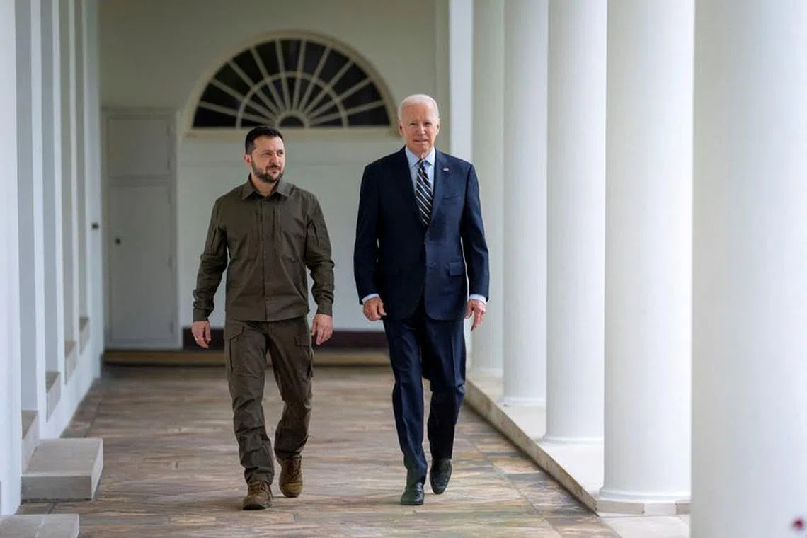 Ukrainian President Volodymyr Zelenskiy walks down the White House colonnade to the Oval Office with U.S. President Joe Biden during a visit to the White House in Washington, U.S., September 21, 2023. Doug Mills/Pool via REUTERS