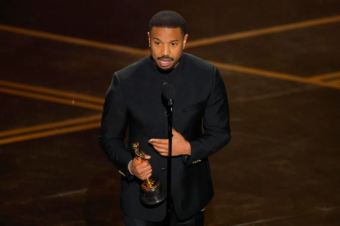 Michael B. Jordan accepts the Oscar for Best Actor for Sinners during the Oscars show at the 98th Academy Awards on March 15.