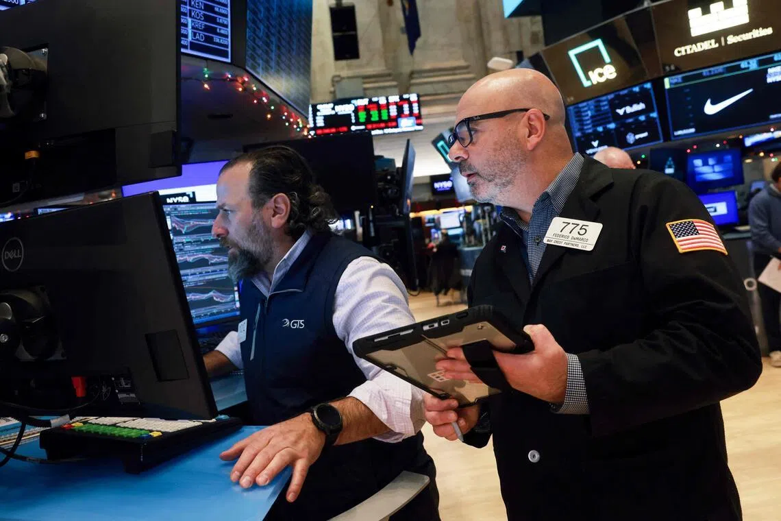 S&P 500, Nasdaq end slightly down in holiday-thin trade, Meta gains on deal