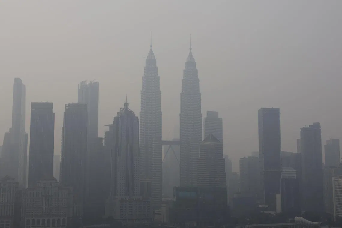 Kuala Lumpur’s skyline shrouded in haze from regional wildfires on Oct 9.