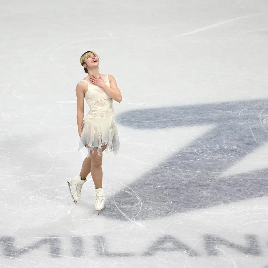Feb 17, 2026; Milan, Italy; Alysa Liu (24) of the United States competes in the womens figure skating short program during the Milano Cortina 2026 Olympic Winter Games at Milano Ice Skating Arena. Mandatory Credit: James Lang-Imagn Images