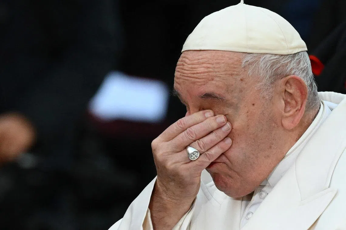 Pope Francis gets emotional after reciting a prayer on behalf of the Ukrainian people in Rome.