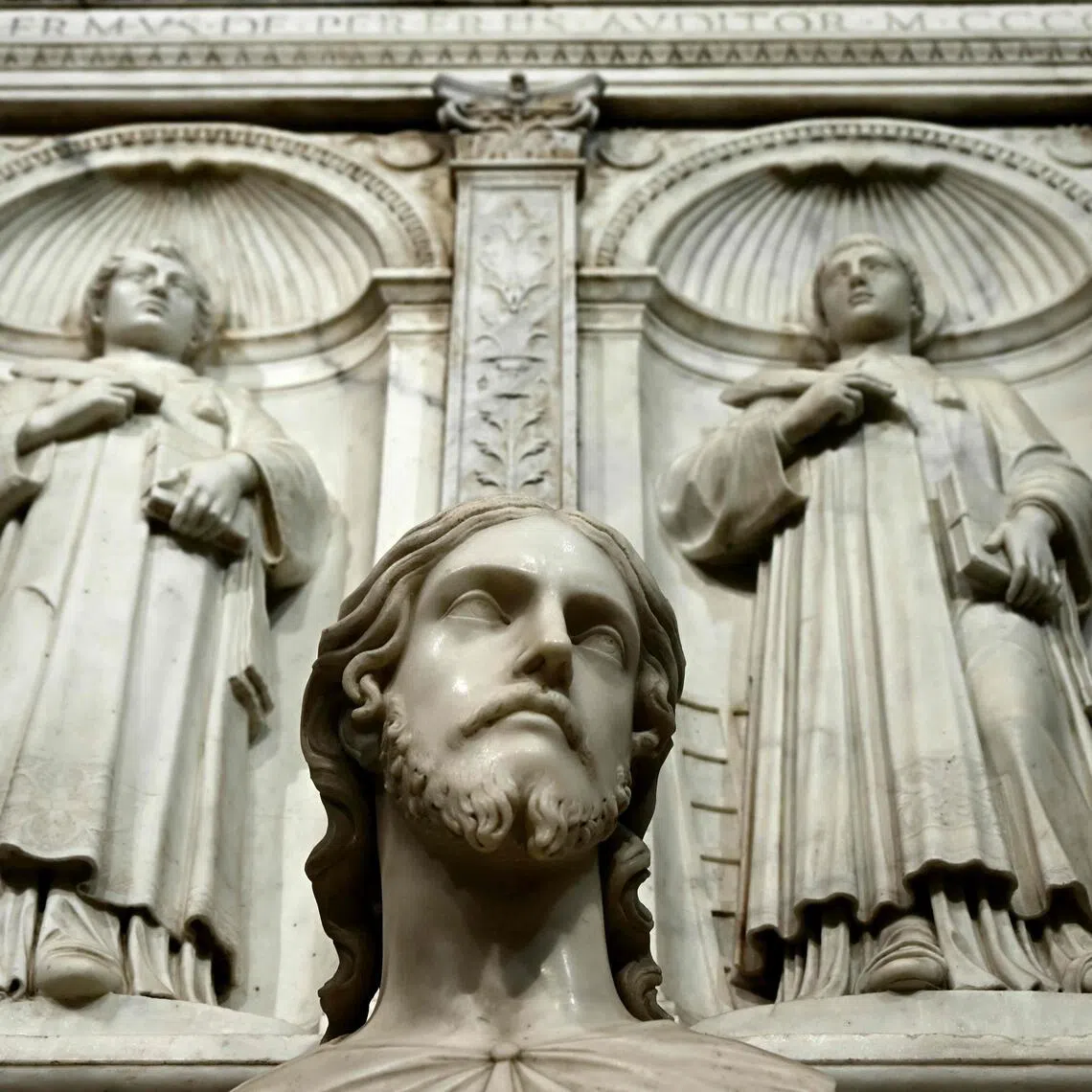 A marble bust displayed inside the Basilica of Sant’Agnese after being identified as a work by Michelangelo.