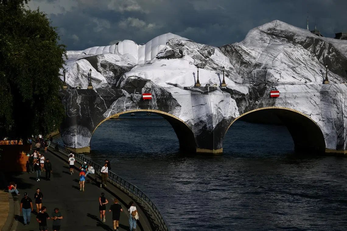 Opening of JR's installation on Paris Pont Neuf bridge delayed after damage