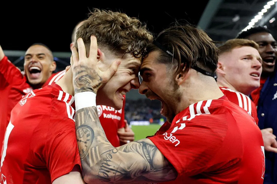 Nottingham Forest's Ryan Yates and Jota Silva celebrate after the match.
