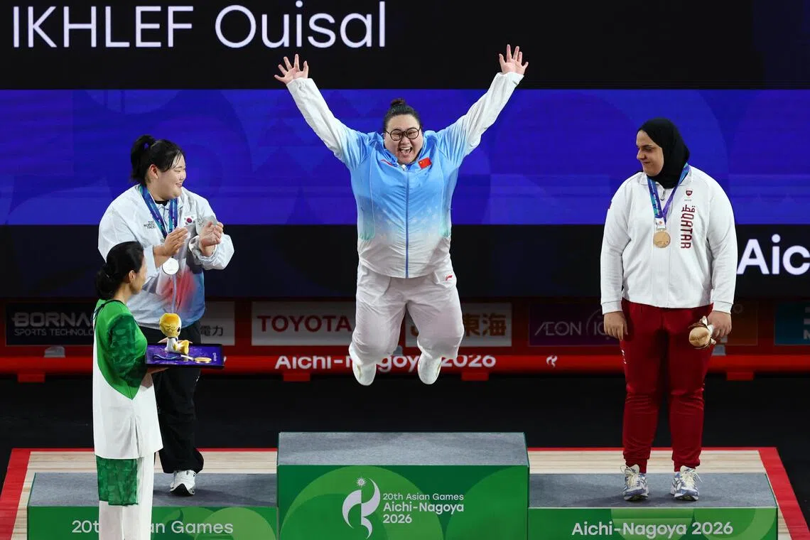 From sleeping on floor to standing on the podium: Mission accomplished for weightlifter Li Wenwen