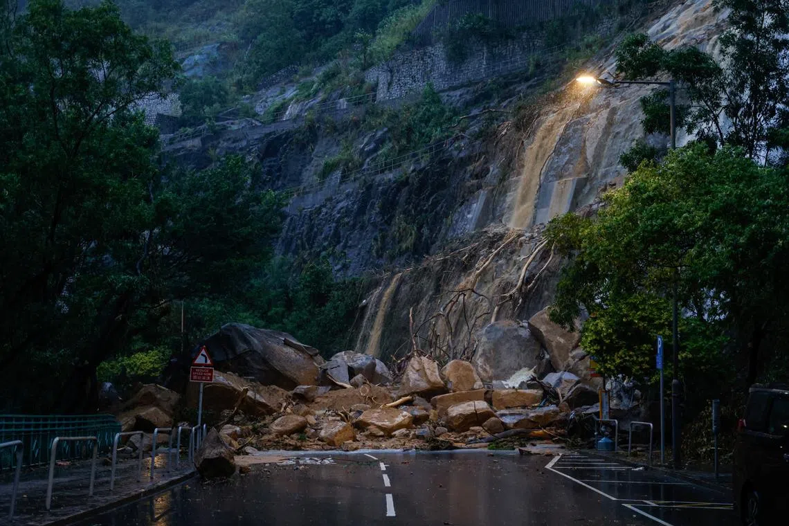A view of a blocked road due to the debris from a landside after heavy rains, in Hong Kong, China, Sep 8, 2023. 