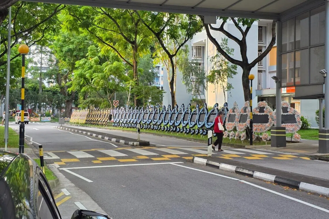 Seventy LED wreaths were placed opposite Pek Kio Community Centre along Gloucester Road for an ongoing wake.