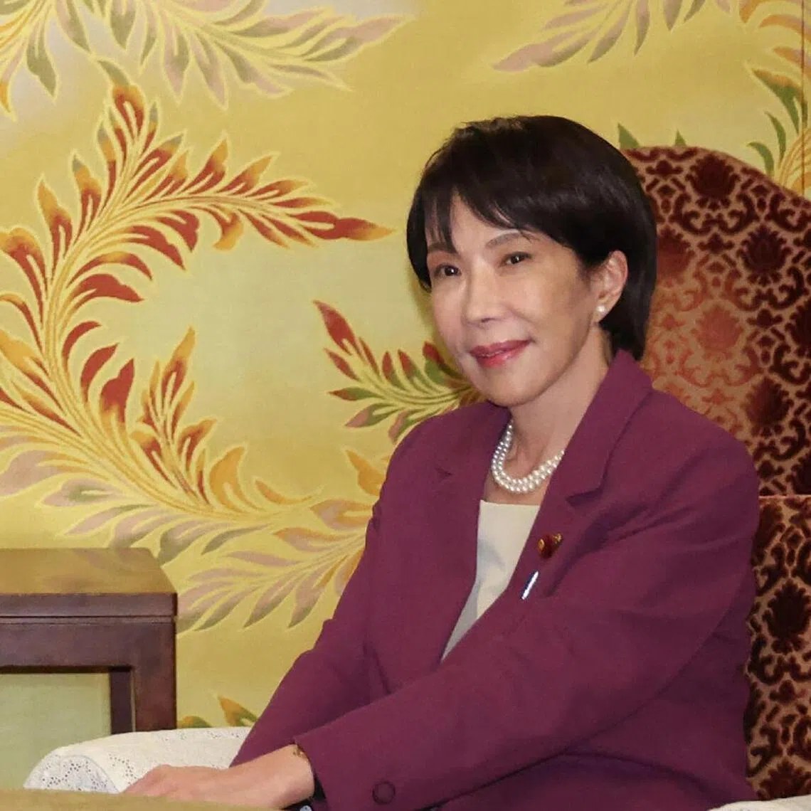 Liberal Democratic Party (LDP) president Sanae Takaichi (R) and co-leader of the opposition Japan Innovation Party Hirofumi Yoshimura meet in Tokyo on Oct 15.