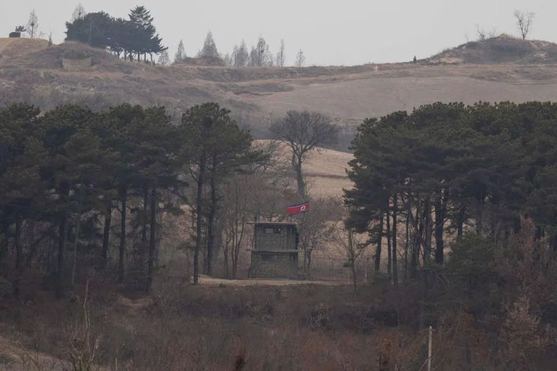 FILE PHOTO: A North Korean guard post is seen from a South Korean observation post inside the JSA during a media tour at the Joint Security Area (JSA) on the Demilitarized Zone (DMZ) in the border village of Panmunjom in Paju, South Korea, 03 March 2023 JEON HEON-KYUN/Pool via REUTERS/FILE PHOTO