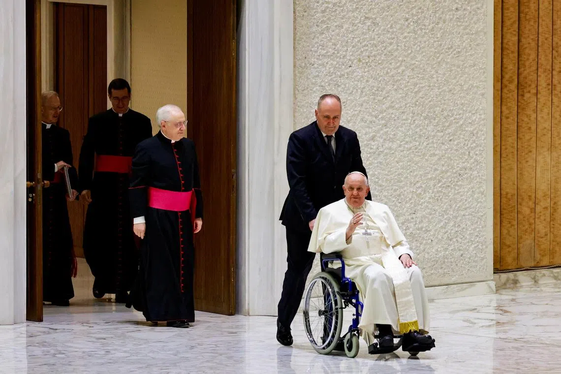 Pope Francis arrives for the weekly general audience, in Paul VI hall at the Vatican, February 28, 2024. REUTERS/Yara Nardi
