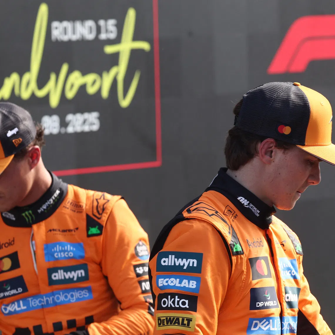 Formula One F1 - Dutch Grand Prix - Circuit Zandvoort, Zandvoort, Netherlands - August 30, 2025 McLaren's Oscar Piastri celebrates after qualifying in pole position with second placed McLaren's Lando Norris REUTERS/Jakub Porzycki