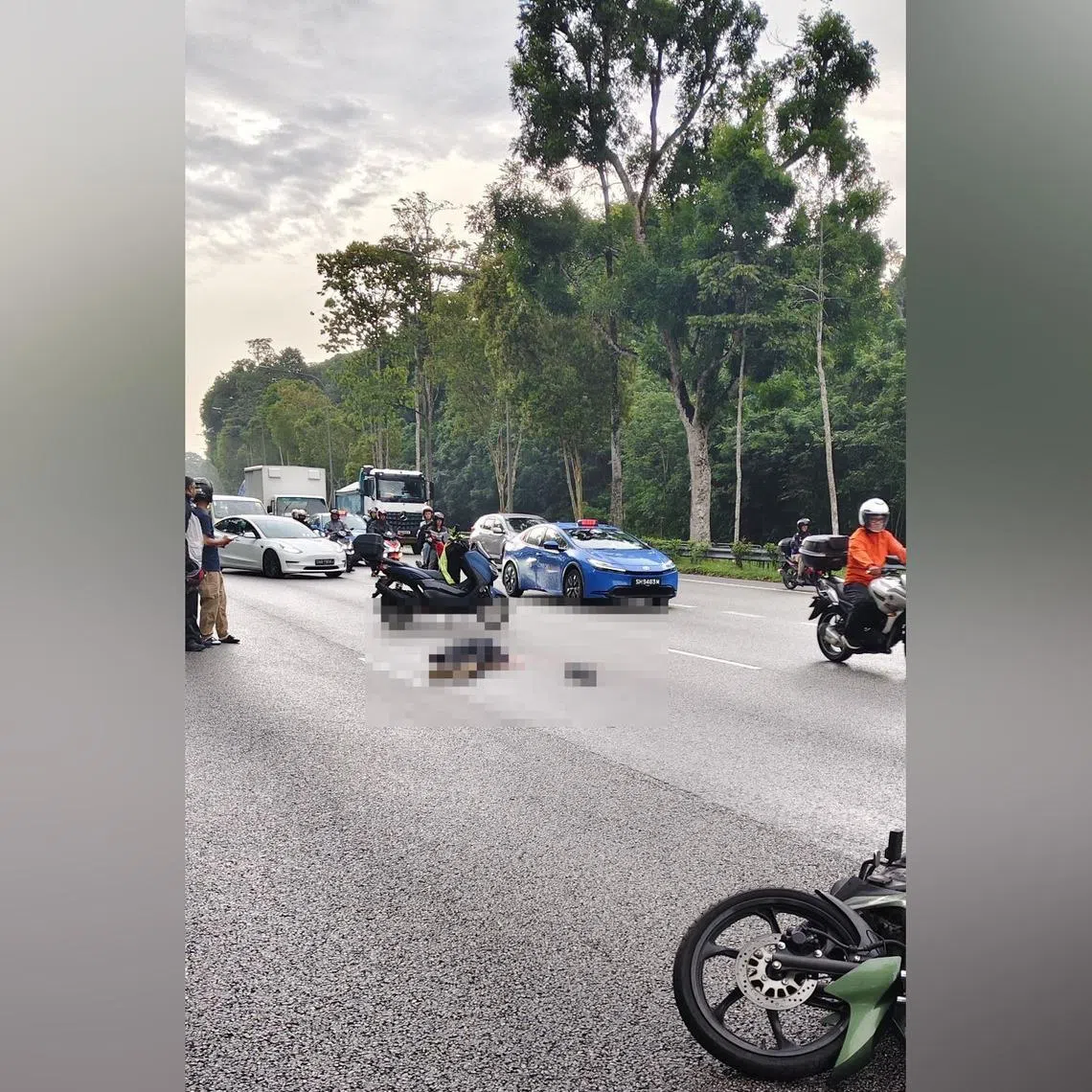 A 34-year-old male motorcyclist was pronounced dead at the scene by an SCDF paramedic.