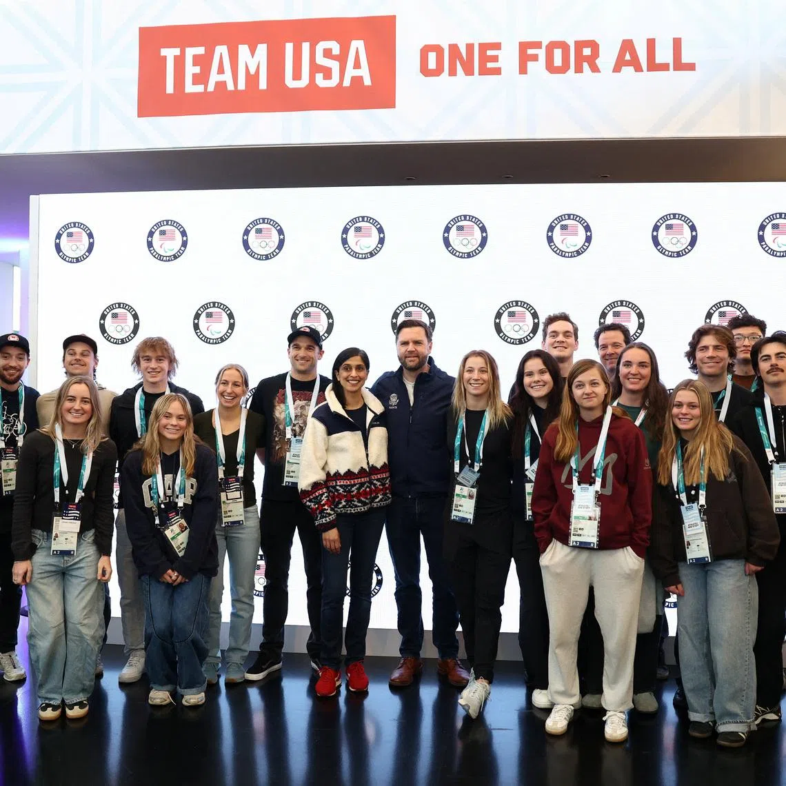 U.S. Vice President JD Vance and second lady Usha Vance pose for a photo with Team USA athletes, at the Team USA Welcome Experience, ahead of the Milano Cortina 2026 Winter Olympic Games in Milan, Italy, February 5, 2026. REUTERS/Kevin Lamarque/Pool