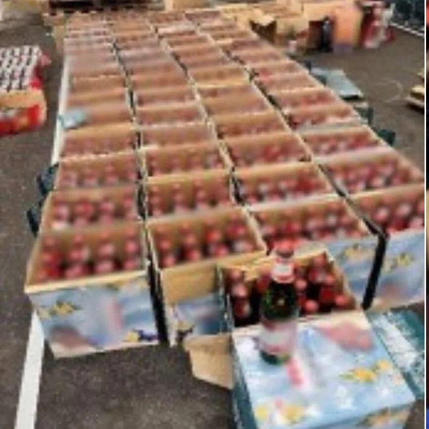 Singapore Customs found 13 pallets containing duty-unpaid beer and liquor hidden among cartons and packaging labelled as non-alcoholic drinks.