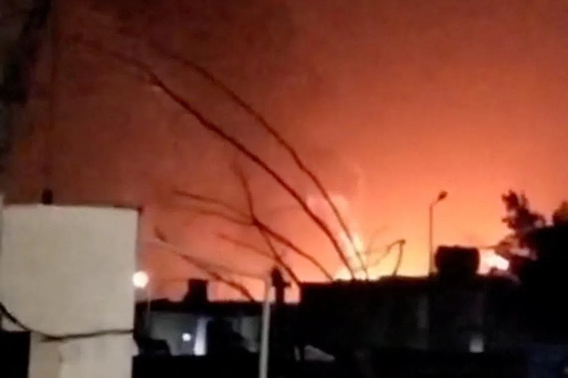 Smoke and flames rise from the direction of an industrial complex, after Saudi Arabia's defense ministry said that air defences intercepted and destroyed ballistic missiles launched towards the Eastern region, amid the U.S.-Israeli conflict with Iran, in Jubail, Saudi Arabia, in this screen grab taken from a social media video released on April 7, 2026. Social Media/via REUTERS