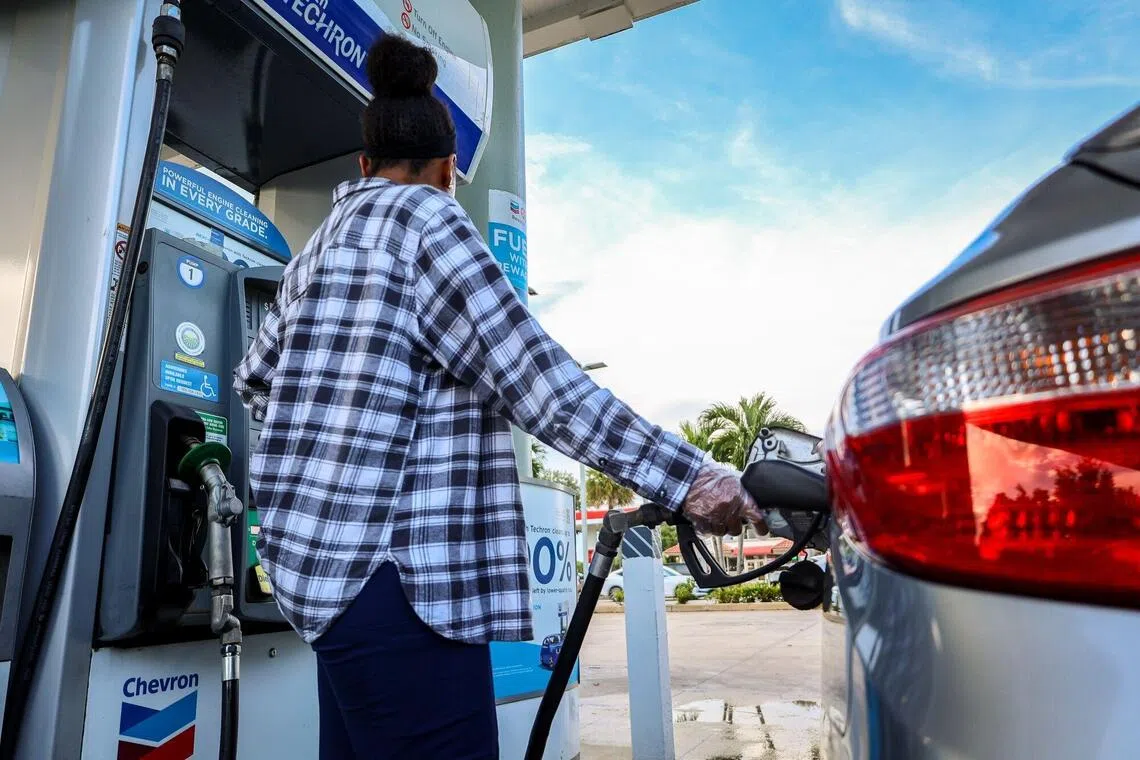 A driver refuels a vehicle with regular gasoline at a Chevron gas station in Miami, Florida, US, on Thursday, Sept. 3, 2026. Gasoline prices were at an average of $4.14 per gallon as of Wednesday, already the highest price ever for September, and well above the $3.80 per gallon drivers paid on July 4, the peak of the summer driving season. Photographer: Zak Bennett/Bloomberg