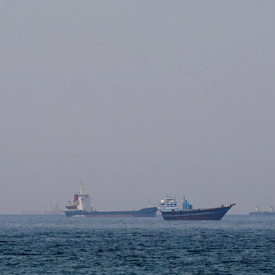 Ships and boats in the Strait of Hormuz - a vital conduit for oil and gas. - on April 20.
