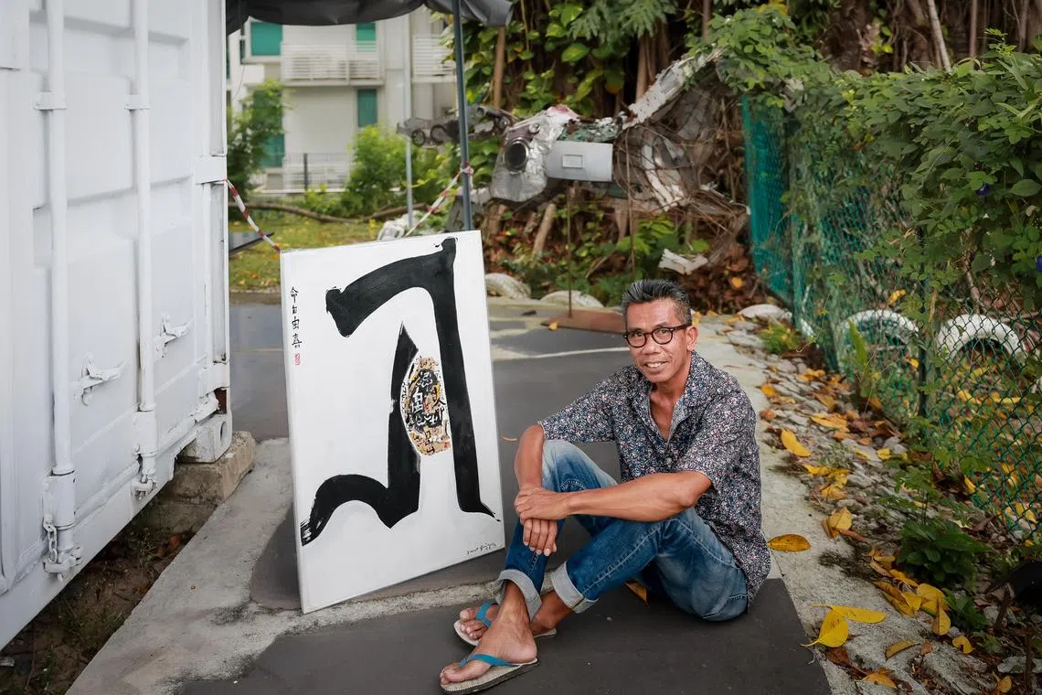 Artist Sunar Sugiyou with his artwork, April 15, 2024.