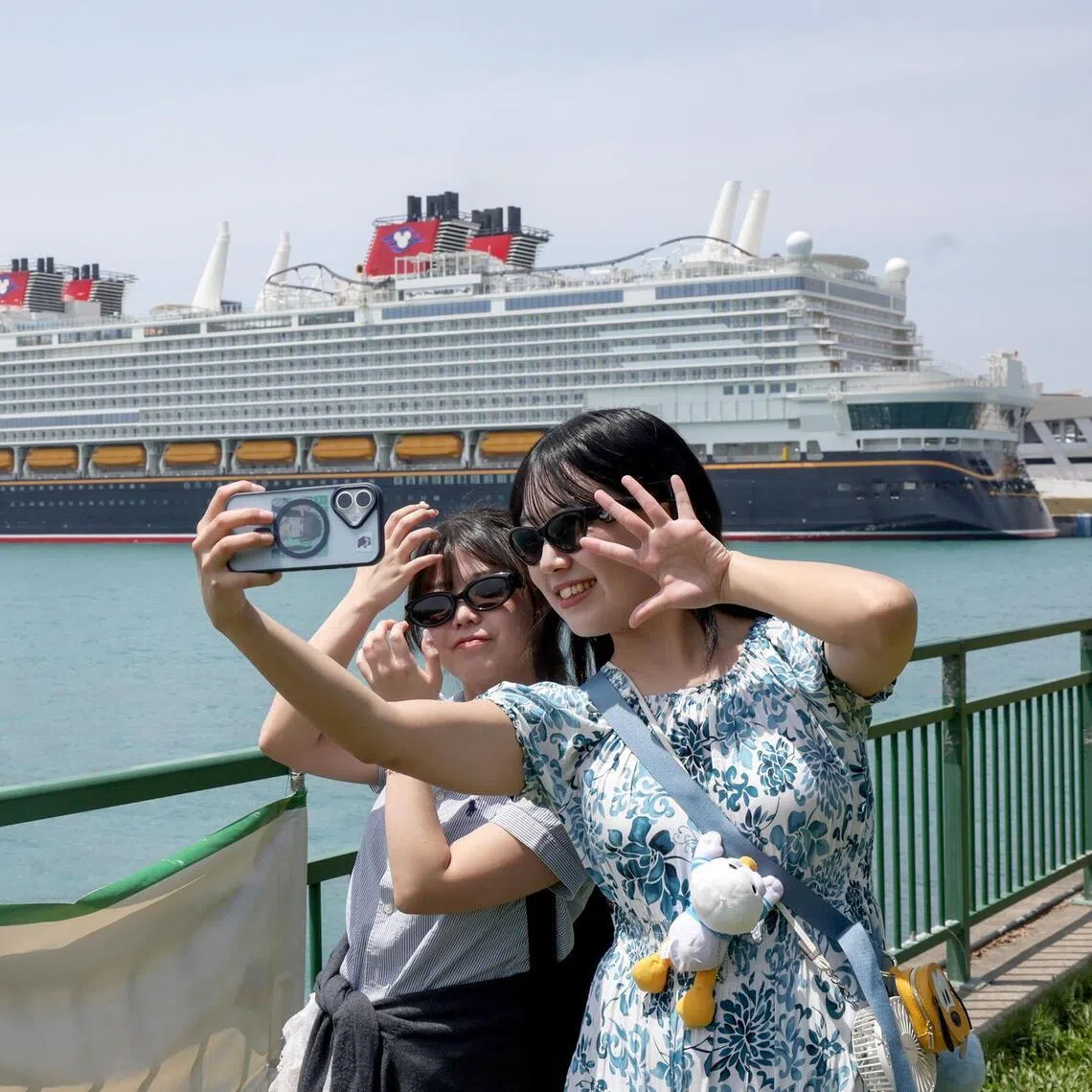 The Disney Adventure cruise ship docked at Marina Bay Cruise Centre Singapore sets off on its first public sailing on March 10.