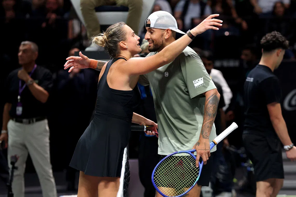 Tennis - 'Battle of the Sexes' - Nick Kyrgios v Aryna Sabalenka - Coca-Cola Arena, Dubai, United Arab Emirates - December 28, 2025 Australia's Nick Kyrgios and Belarus' Aryna Sabalenka after their match  Christopher Pike/Pool via REUTERS