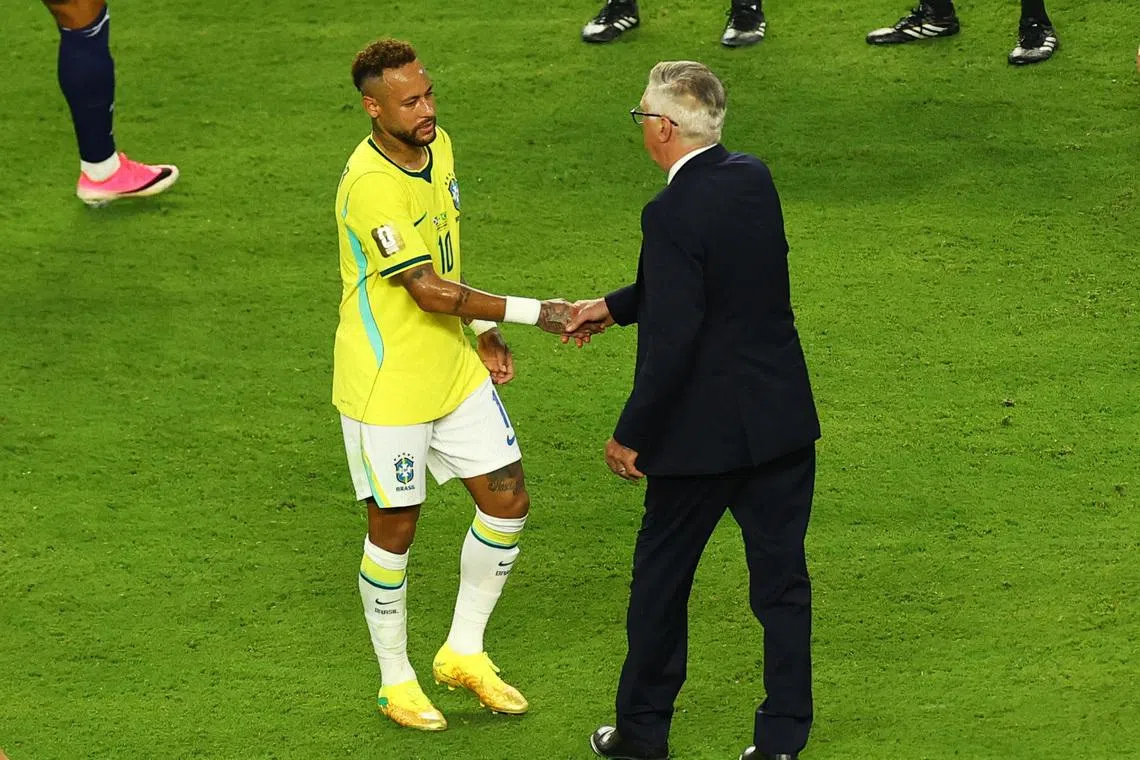 Soccer Football - FIFA World Cup 2026 - Group C - Scotland v Brazil - Miami Stadium, Miami Gardens, Florida, U.S. - June 24, 2026 Brazil's Neymar Jr. shakes hands with coach Carlo Ancelotti after the match REUTERS/Marco Bello