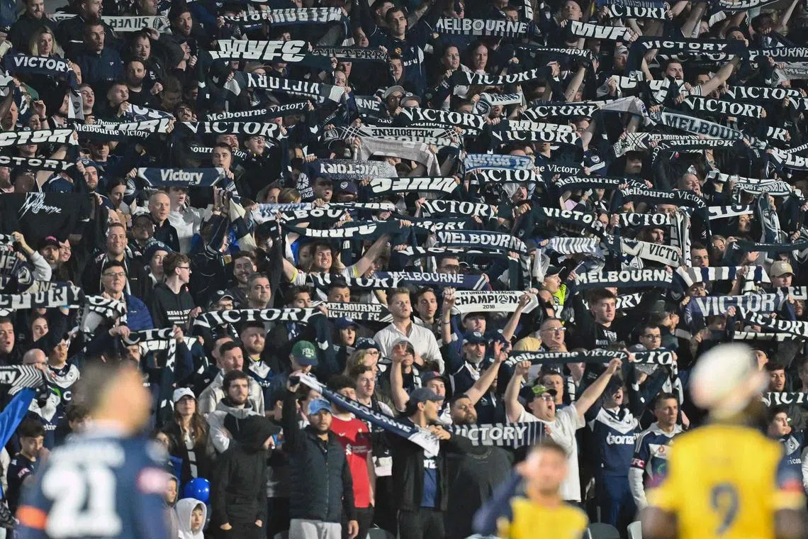 Melbourne Victory fans cheering during the A-League grand final which they lost 3-1 in extra time to Central Coast Mariners in Gosford on May 25, 2024.