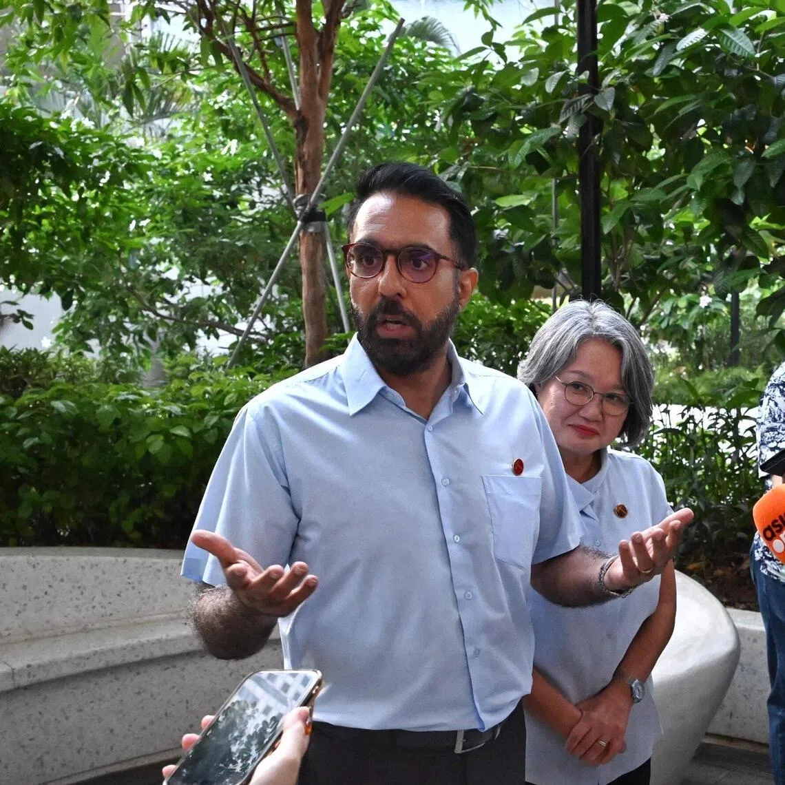 Pritam Singh (left) and Sylvia Lim speaking to media after the party’s internal elections on June 28.