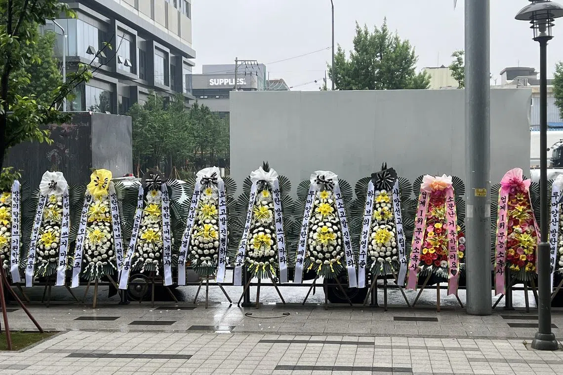 BTS' fandom Army sent wreaths as a protest to music label Hybe's headquarters in Yongsan, Seoul.