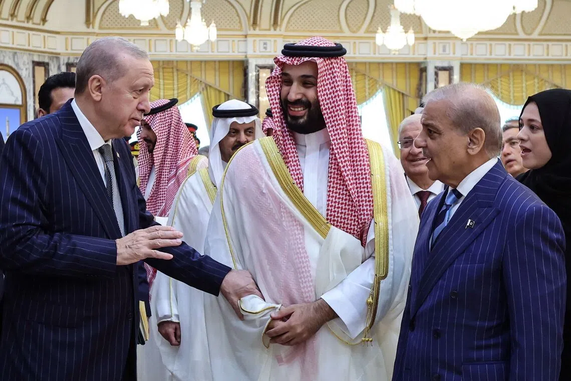 (From left) Turkish President Recep Tayyip Erdogan, Saudi Arabia’s Crown Prince Mohammed bin Salman and Pakistani Prime Minister Shehbaz Sharif in Mecca on Aug 7.