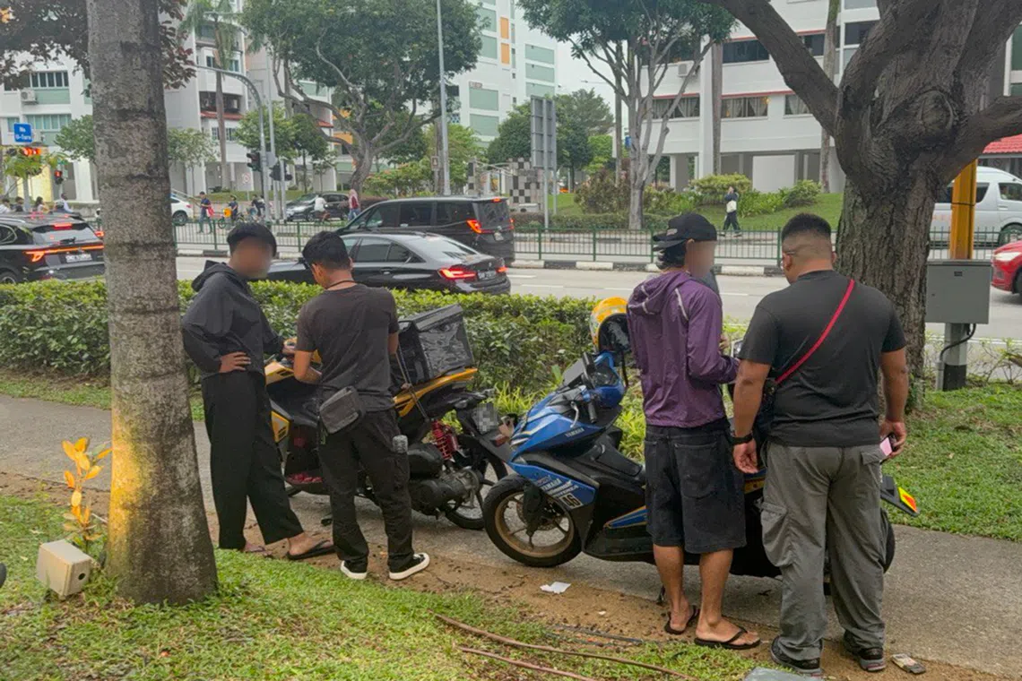 HSA officers conducting checks during a raid in Tampines on Sept 17.