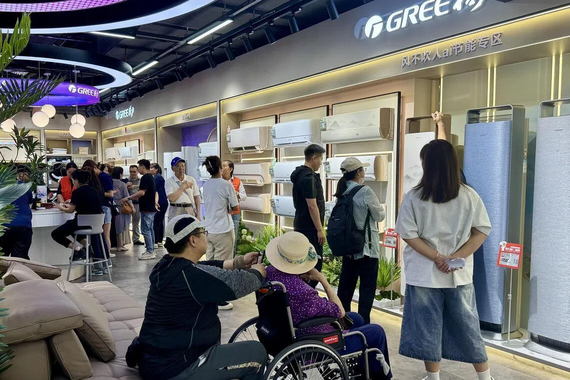 mnshop - Shoppers at Chinese home appliances brand Gree in JD Mall in Beijing on June 18, 2025.
Credit: ST PHOTO Michelle Ng