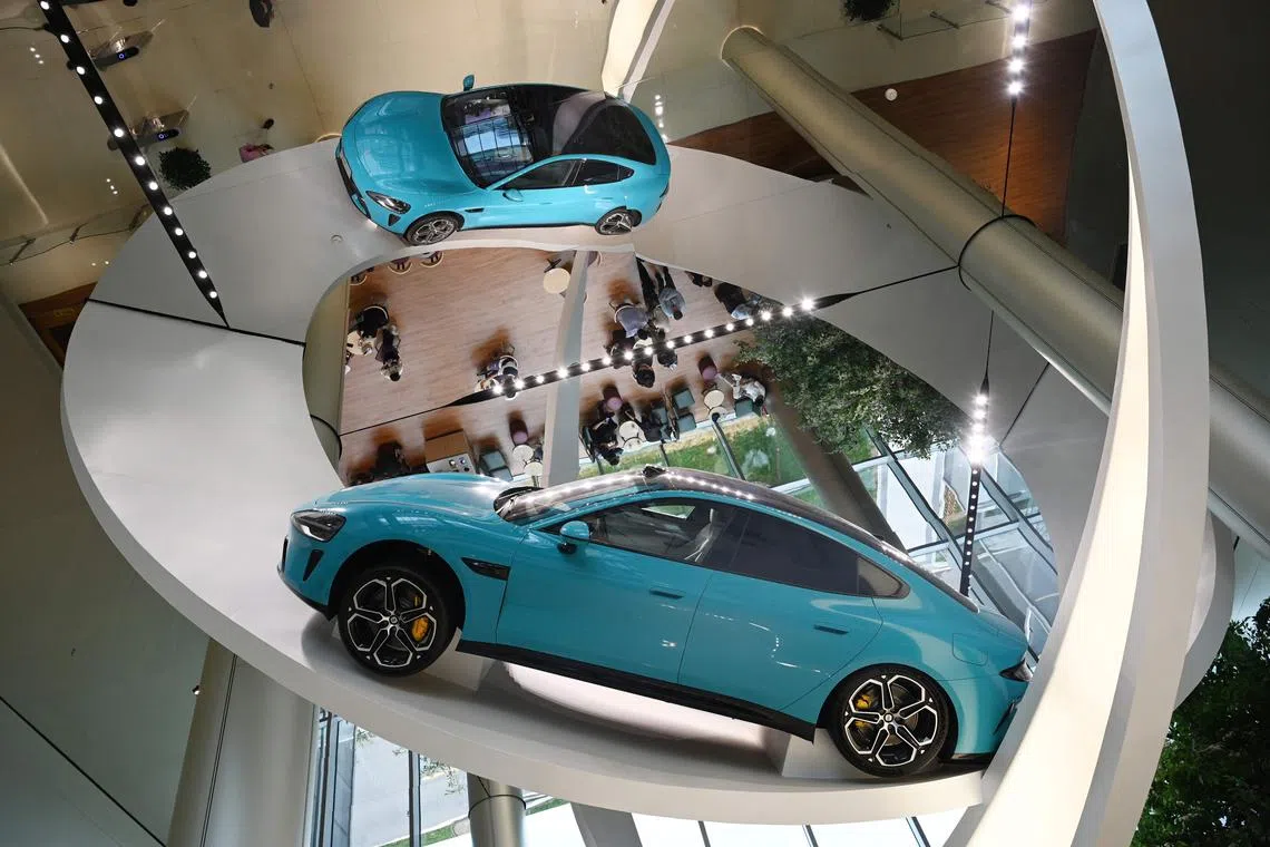 A Xiaomi SU7 Max car on display at the Xiaomi EV Factory in Beijing. Xiaomi is aiming to reinvent itself as a manufacturing powerhouse.