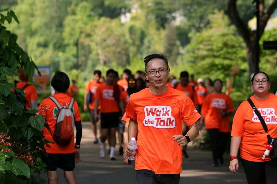 Psychiatrist and recovered transplant recipient Daniel Kwek taking part in the 2.5km Walk the Talk walkathon organised by Bone Marrow Donor Programme (BMDP) at Bidadari Park on Oct 31.