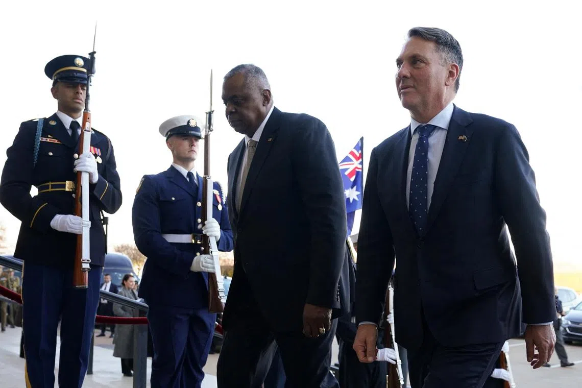 U.S. Defense Secretary Lloyd Austin escorts Australian Defense Minister Richard Marles into the Pentagon for their meeting in Washington, U.S., December 5, 2022.
REUTERS/Kevin Lamarque