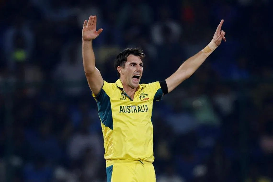 Cricket - ICC Cricket World Cup 2023 - Australia v Netherlands - Arun Jaitley Stadium, New Delhi, India - October 25, 2023 Australia's Pat Cummins celebrates after taking the lbw wicket of Netherlands' Bas de Leede REUTERS/Adnan Abidi