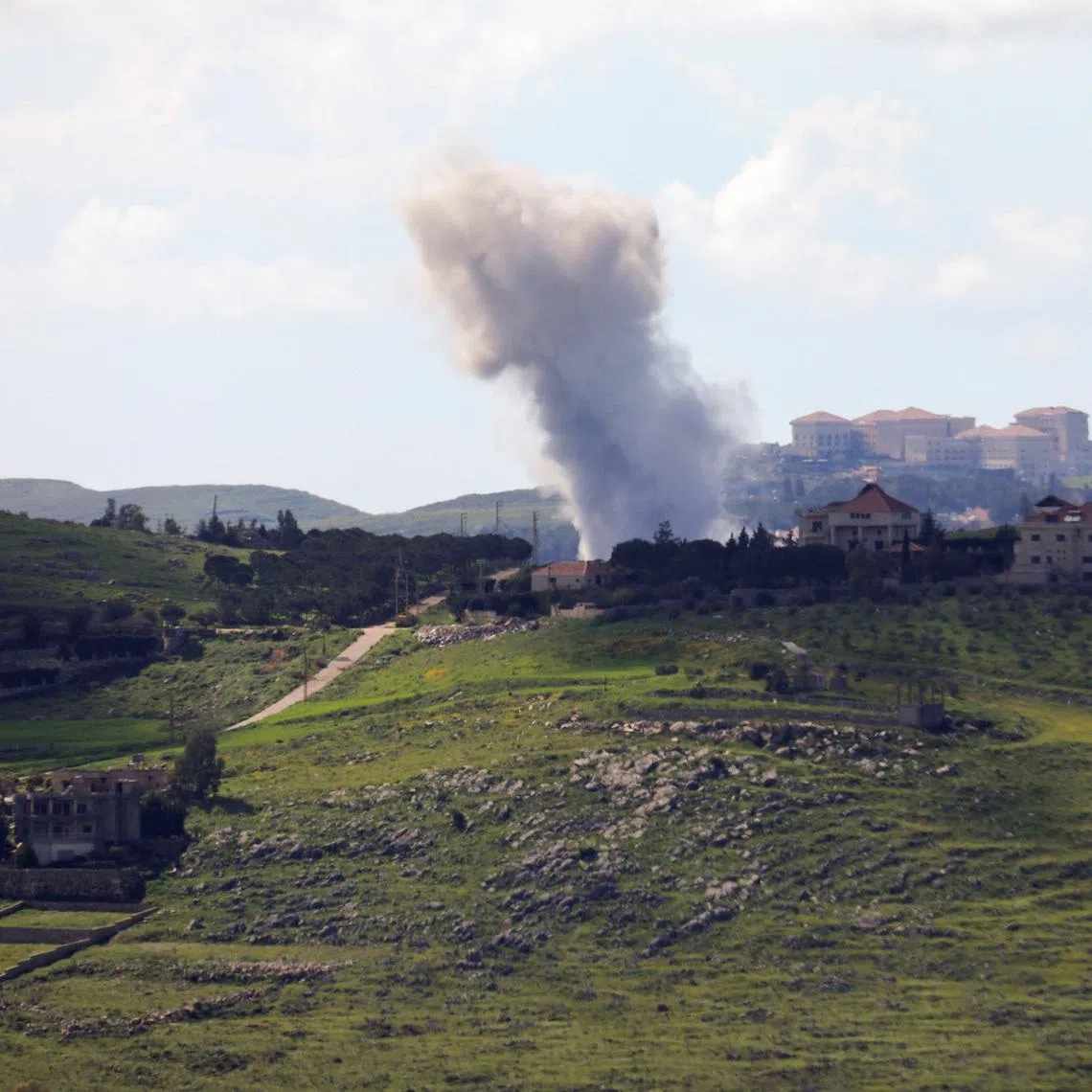 Smoke rises following an Israeli strike, amid escalating hostilities between Israel and Hezbollah, as the U.S.-Israeli conflict with Iran continues, in southern Lebanon, April 7, 2026.  REUTERS/Stringer