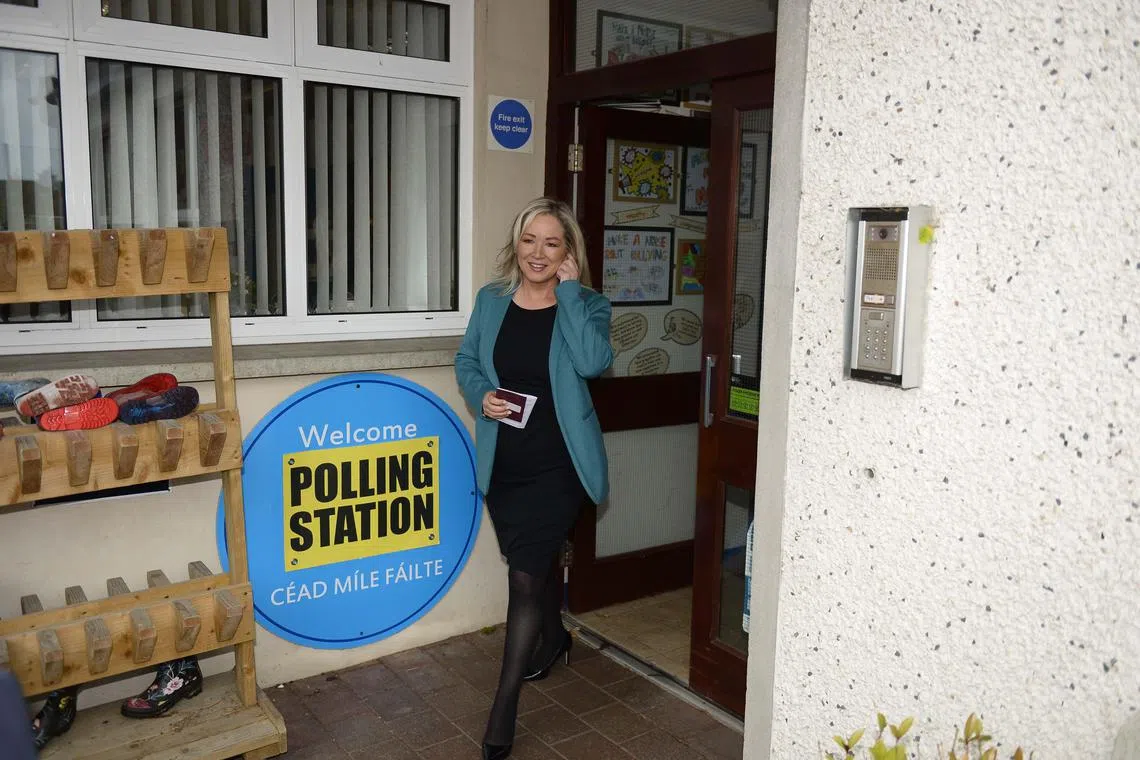 First Minister of Northern Ireland, Ms Michelle O'Neill, leaves St Patrick's primary school polling station.