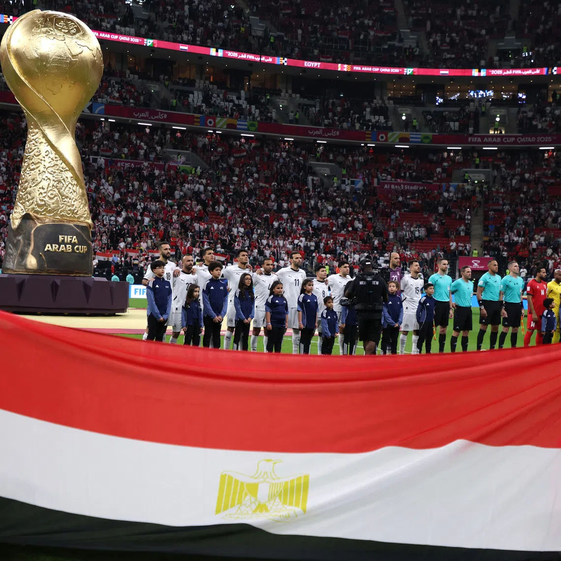 Soccer Football - FIFA Arab Cup - Qatar 2025 - Group C - Egypt v Jordan - Al Bayt Stadium, Al Khor, Qatar - December 9, 2025 General view as the Egypt players line up during the national anthems before the match REUTERS/Ibraheem Al Omari